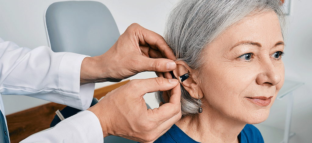 Woman getting fitted for hearing aids